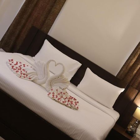 Aroma Ayur Heritage Mattanur Bagian luar foto
